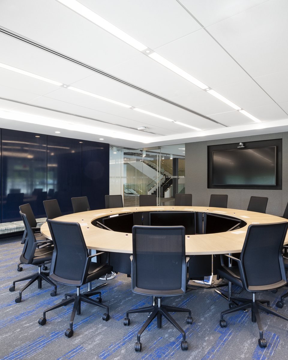 Executive boardroom with wood casework and flooring